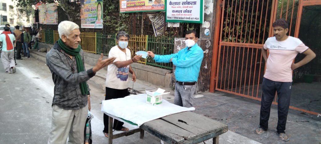 yashasvi pradhanmantri shri narendra modi ji dwara bataye gaye ayurvedik kadha or mask vitran
