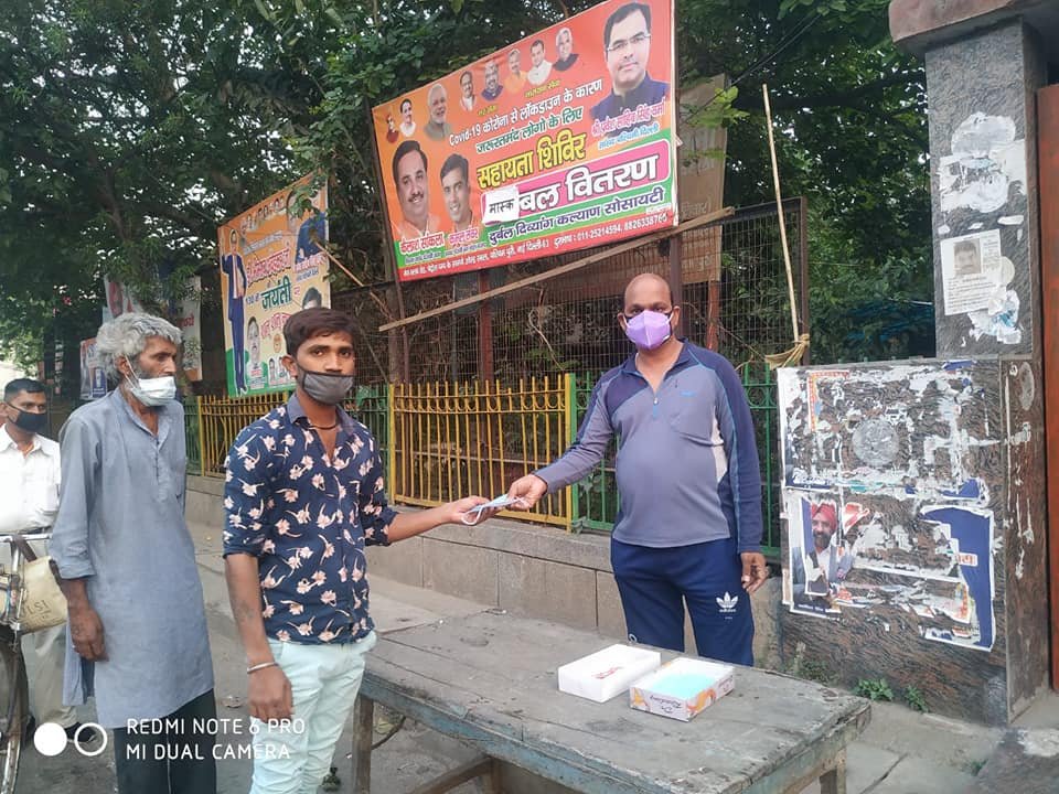 yashasvi pradhanmantri shri narendra modi ji dwara bataye gaye ayurvedik kadha or mask vitran