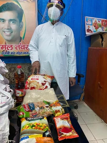 yashasvi pradhanmantri shri narendra modi ji dwara bataye gaye ayurvedik kadha or mask vitran